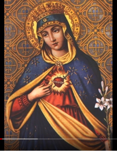 Marie avec un lys en main